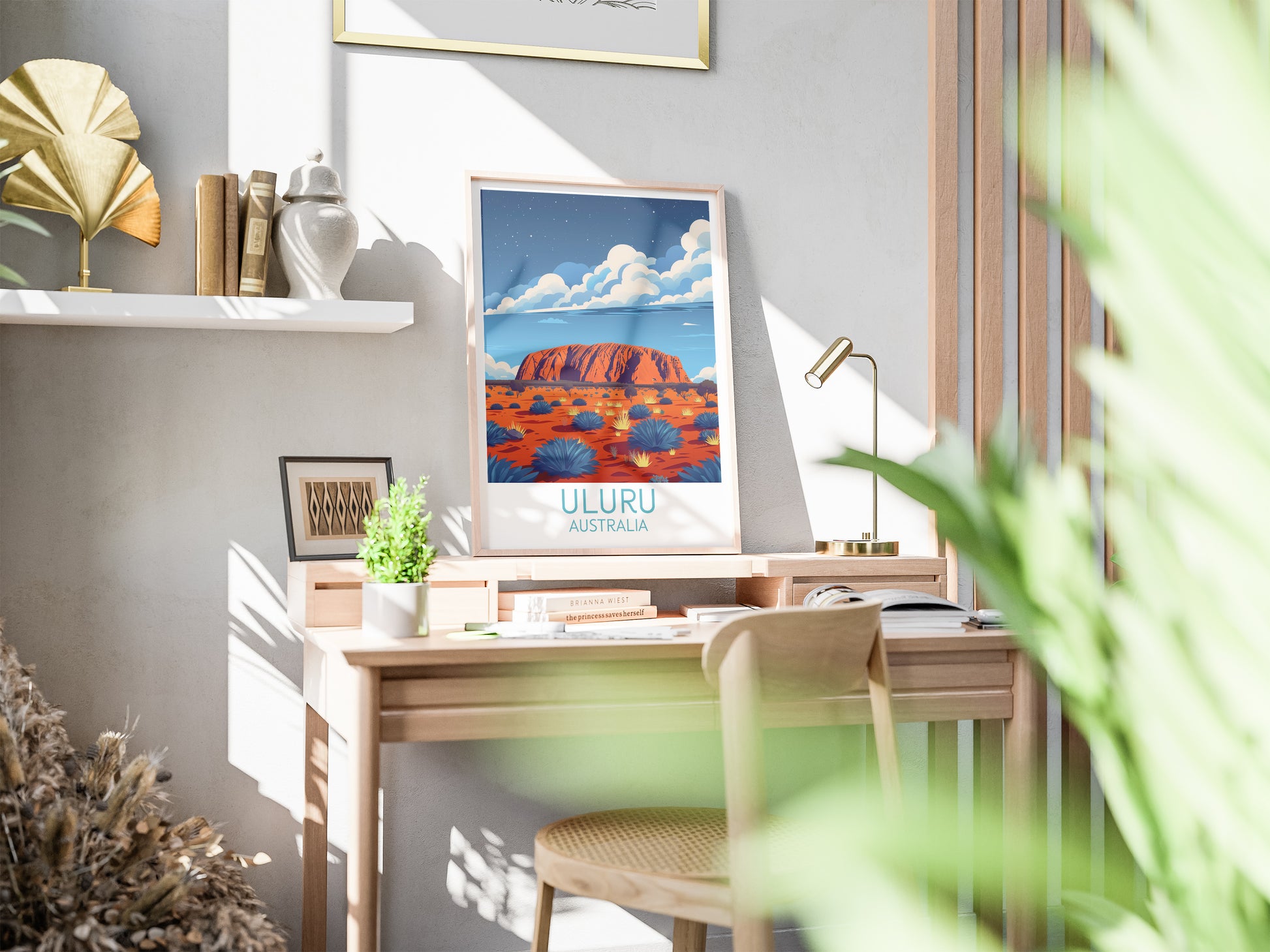 Uluru travel poster on desk Australia