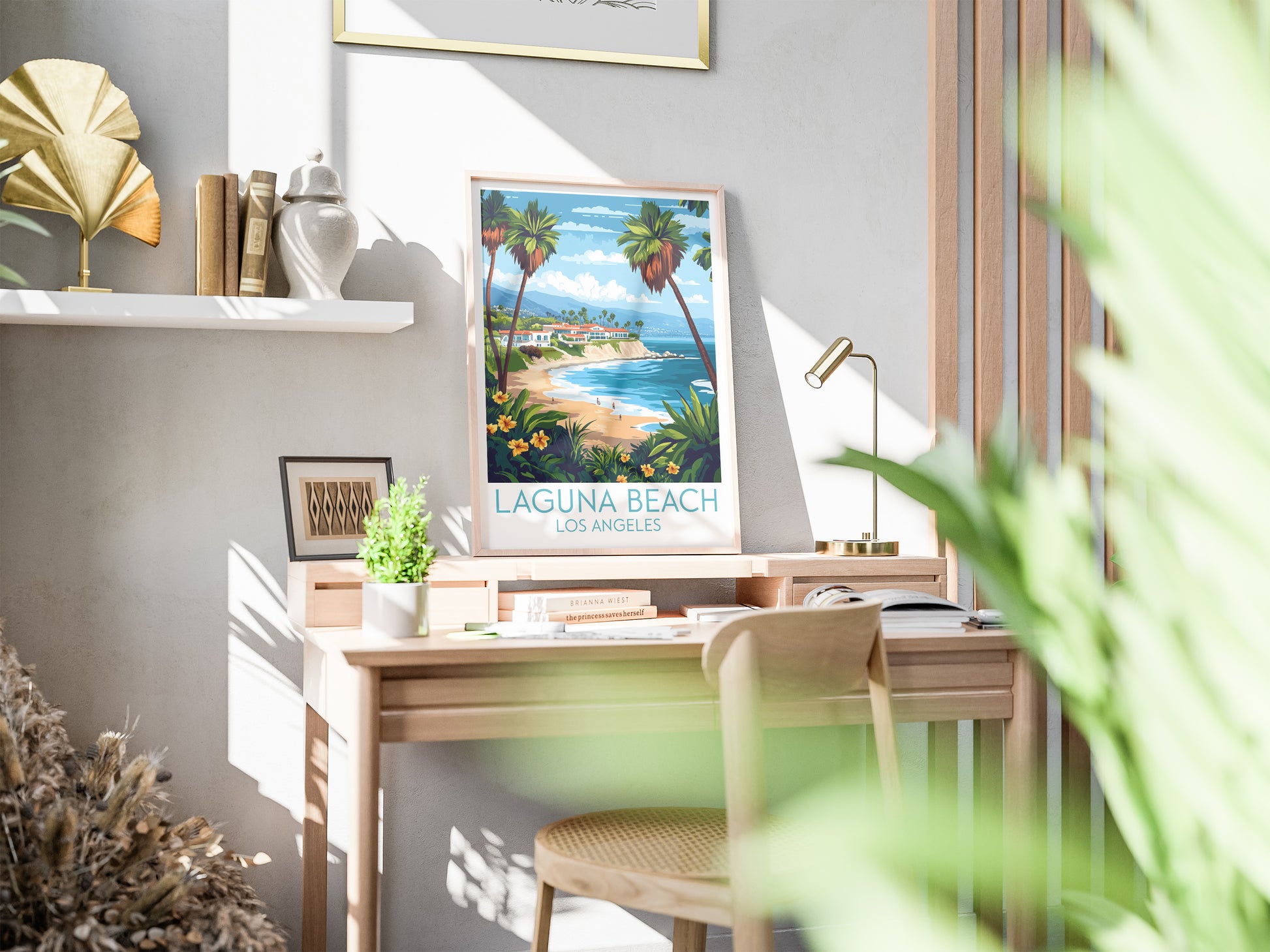 Laguna Beach travel poster on desk Los Angeles