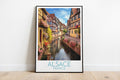 alsace travel poster on the ground france