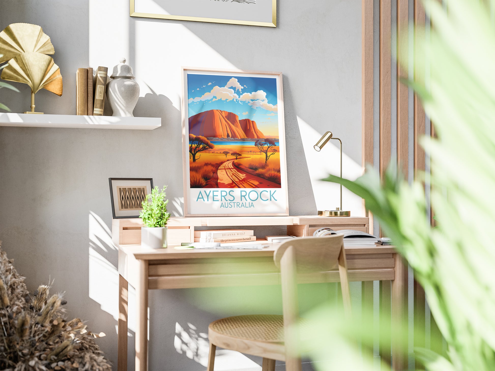 ayers rock travel poster on desk australia