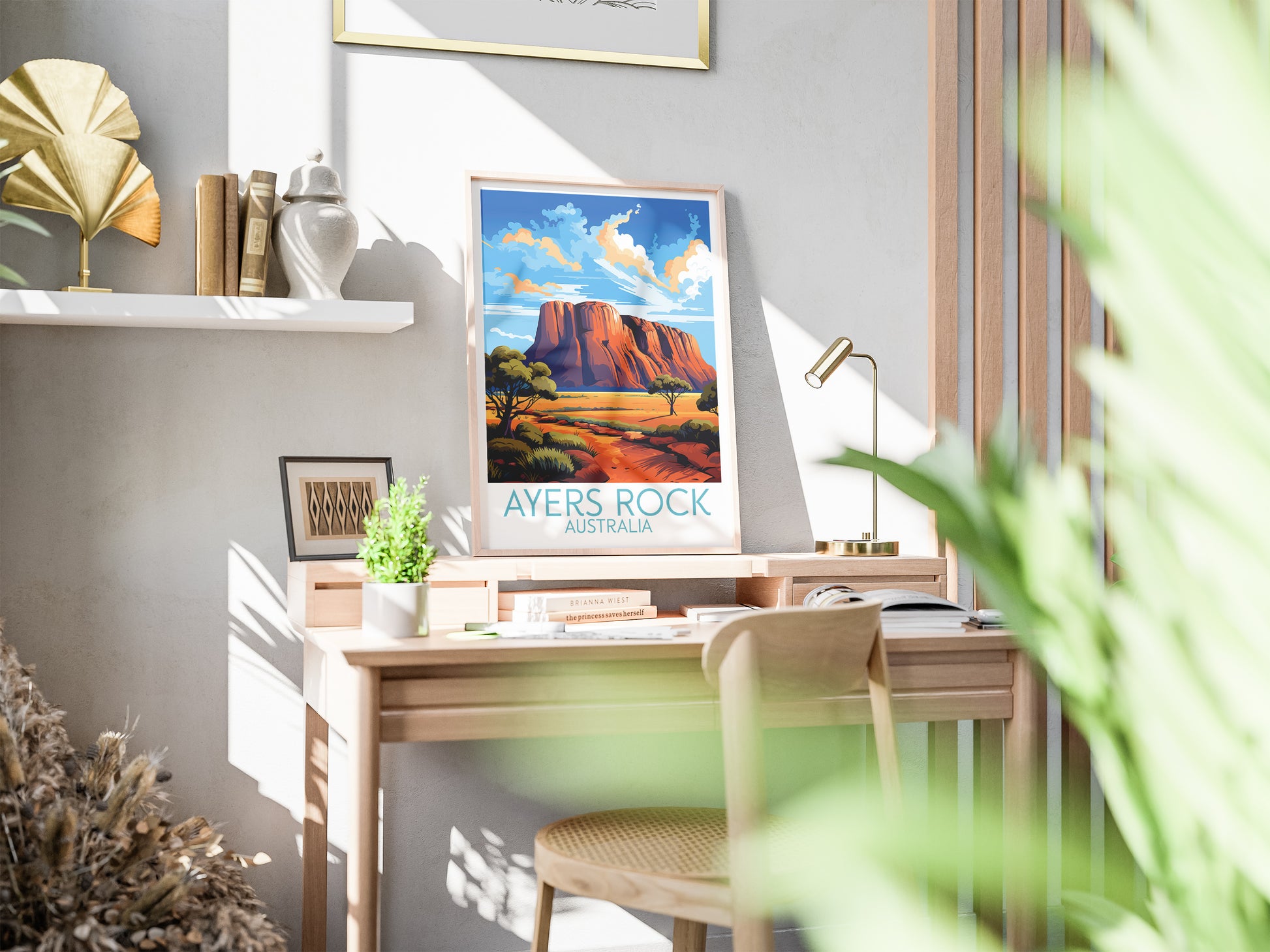 ayers rock travel poster on desk australia